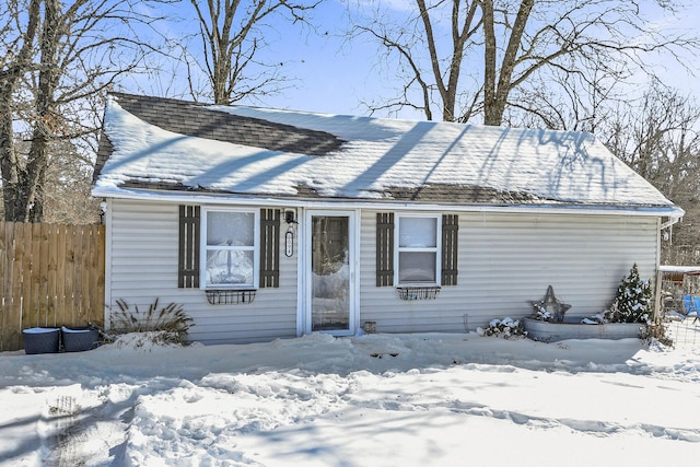 view of front of house with fence