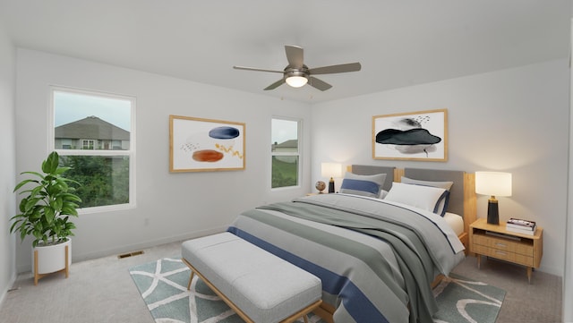 bedroom with light colored carpet and ceiling fan