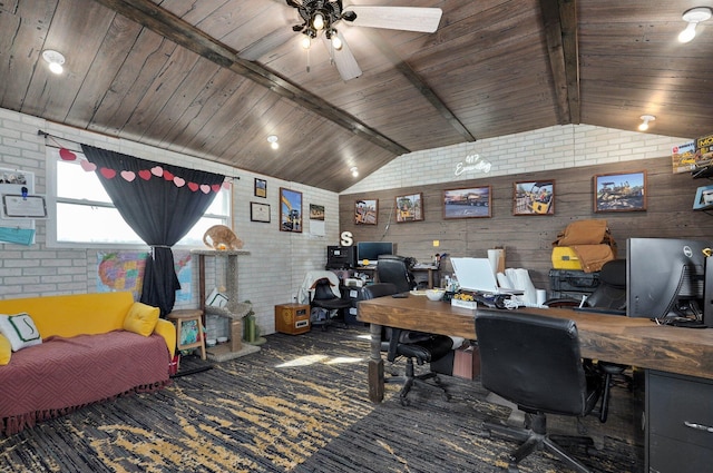 home office with vaulted ceiling with beams, wooden ceiling, and brick wall