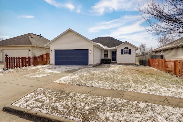 ranch-style house featuring a garage