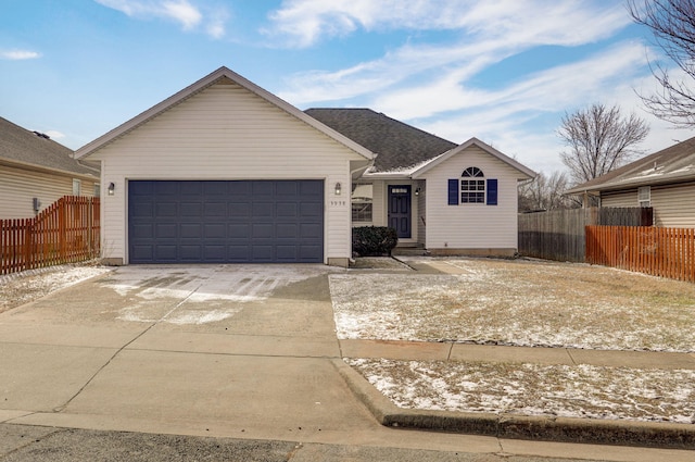 single story home featuring a garage