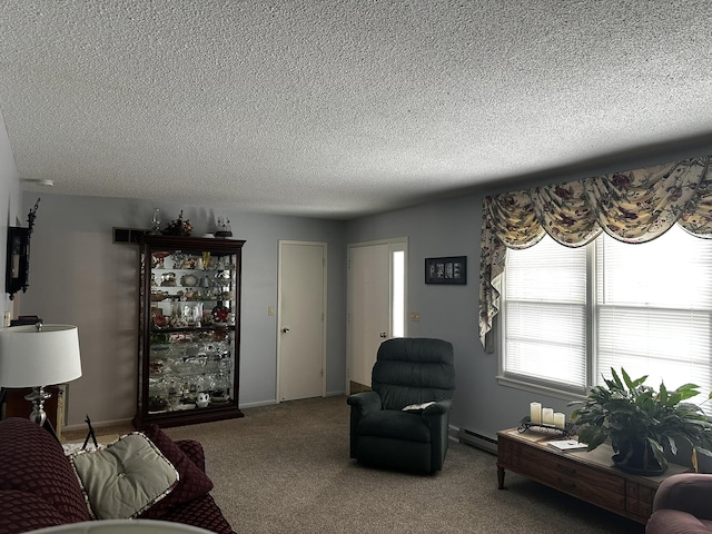 carpeted living room with a textured ceiling and baseboard heating