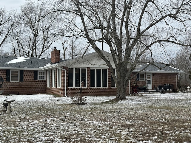 view of snow covered property