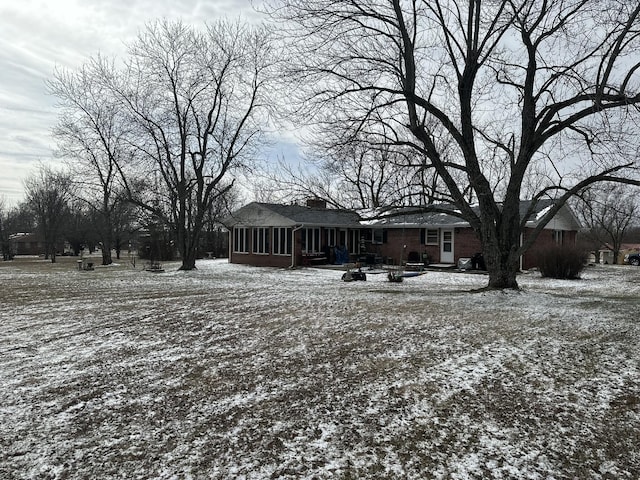 exterior space with a sunroom