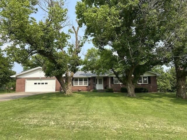 830 Tower Rd, Lebanon, MO 65536 - single story home featuring concrete driveway, brick siding, a front lawn, and an attached garage
