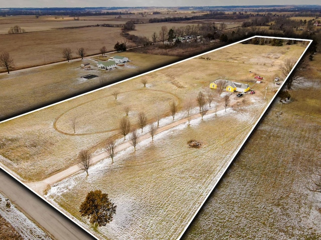 birds eye view of property featuring a rural view