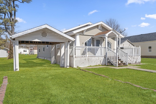 view of front facade featuring covered porch and a front yard