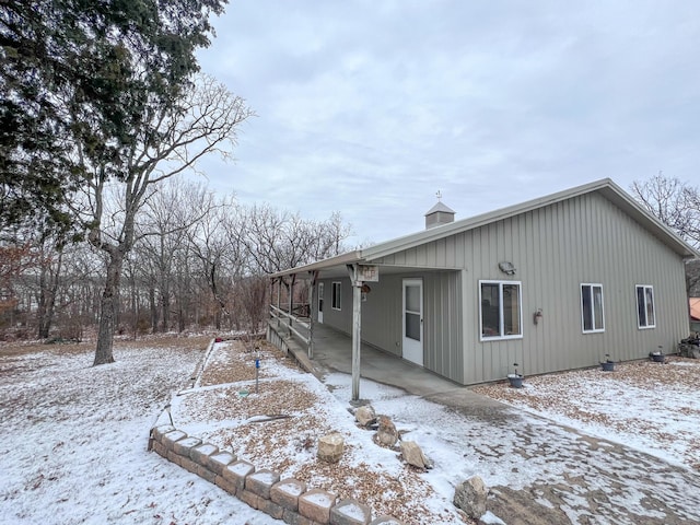 view of snow covered property