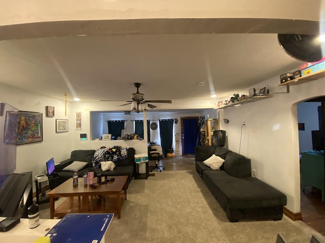 living room with ceiling fan