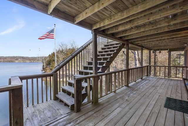 wooden deck with a water view