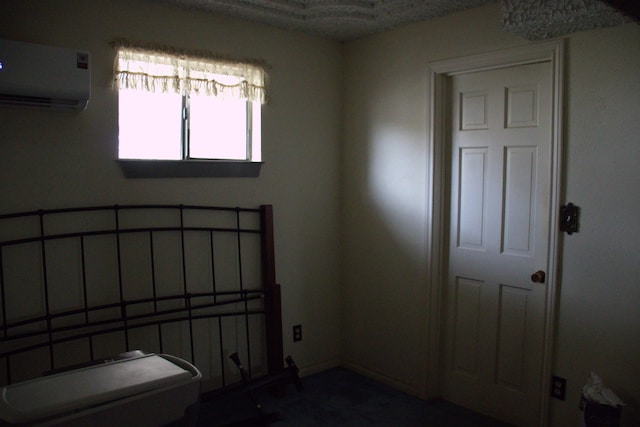 empty room featuring a wall mounted AC