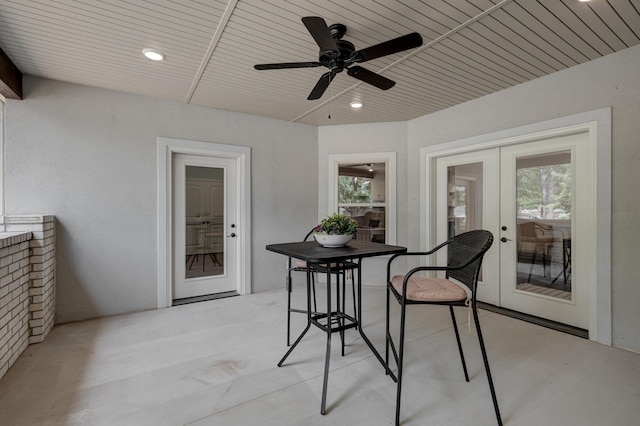 sunroom / solarium with french doors and wood ceiling