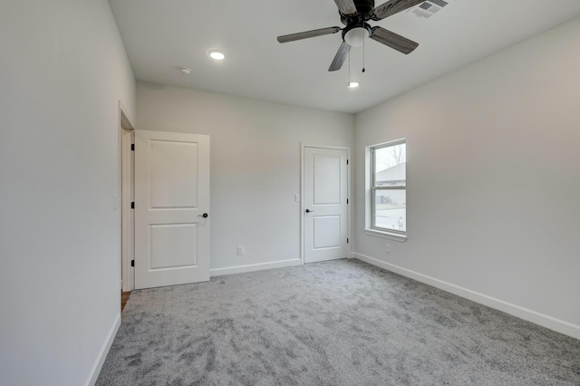 unfurnished bedroom with carpet and ceiling fan