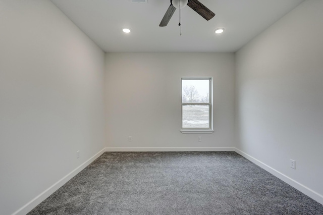 unfurnished room featuring carpet and ceiling fan