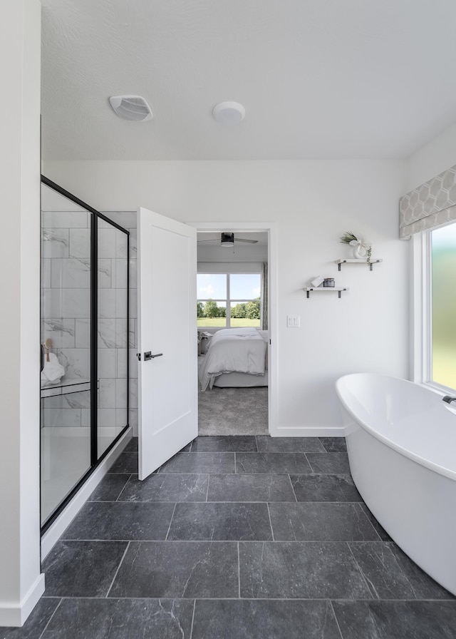 bathroom with shower with separate bathtub