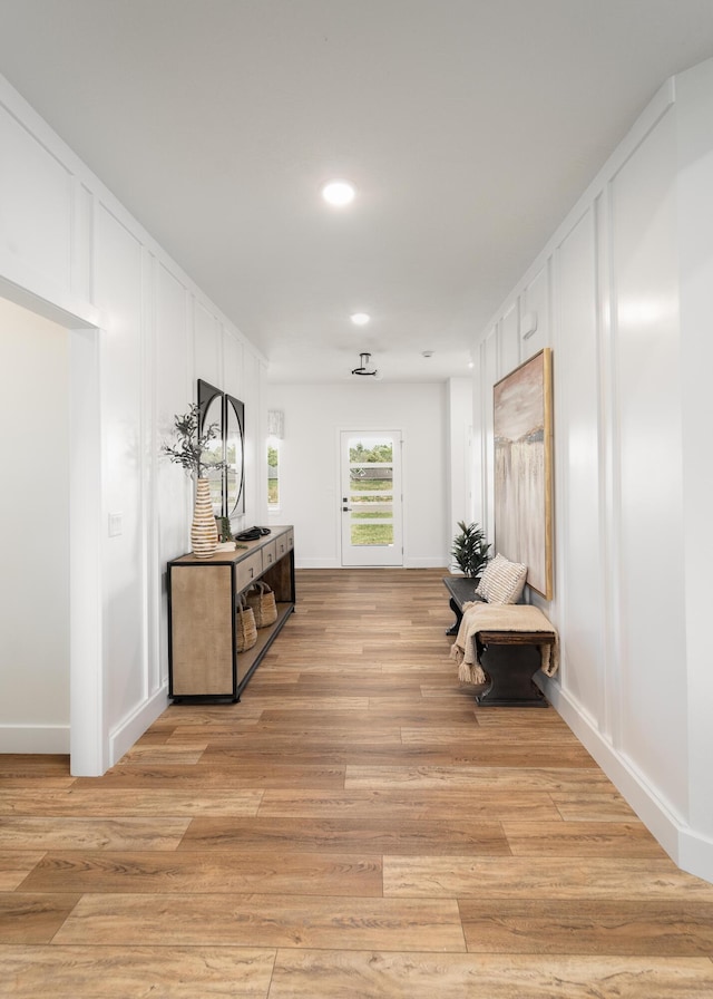 hallway featuring light wood-type flooring