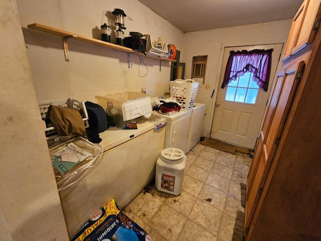 laundry area with separate washer and dryer