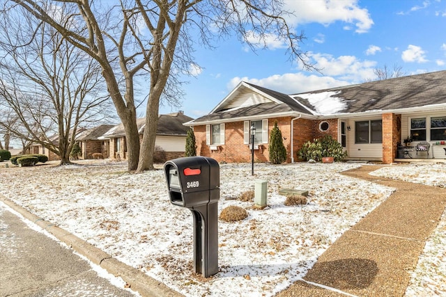 ranch-style home with brick siding