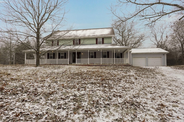 view of front of house with an attached garage and a porch