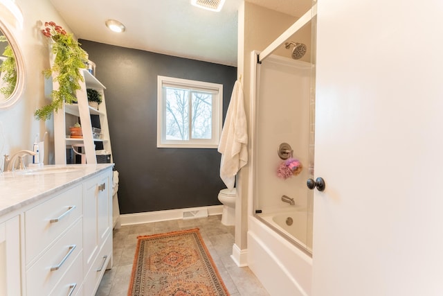 full bathroom with visible vents, baseboards, toilet, shower / bathtub combination, and vanity