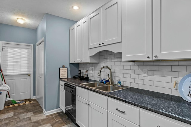 kitchen featuring backsplash, black dishwasher, white cabinets, and a sink