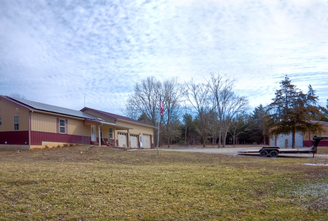 view of yard featuring a garage