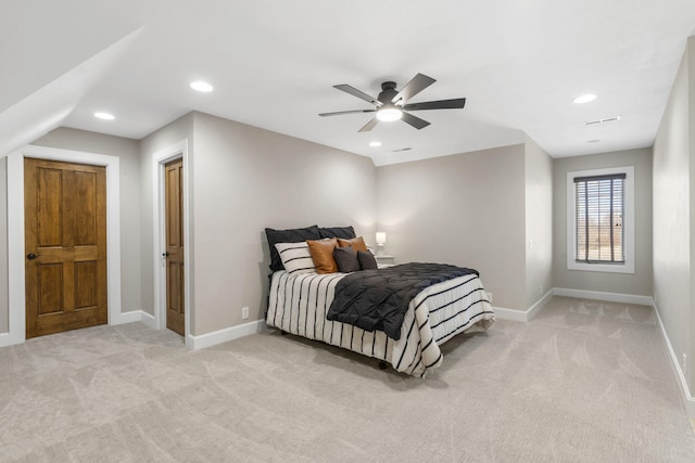 bedroom with light carpet, recessed lighting, a ceiling fan, and baseboards