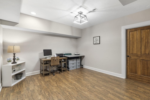 office area featuring recessed lighting, dark wood-style flooring, visible vents, and baseboards