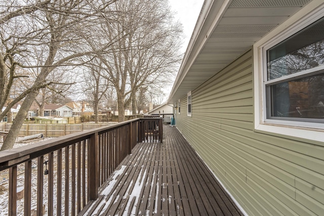 wooden deck featuring fence and a residential view