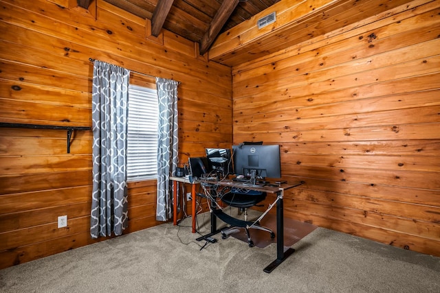 carpeted home office featuring lofted ceiling with beams, wood walls, and wooden ceiling