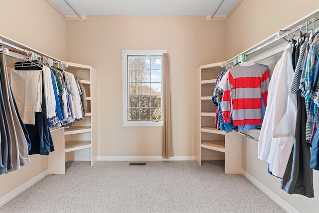 spacious closet featuring carpet floors and visible vents