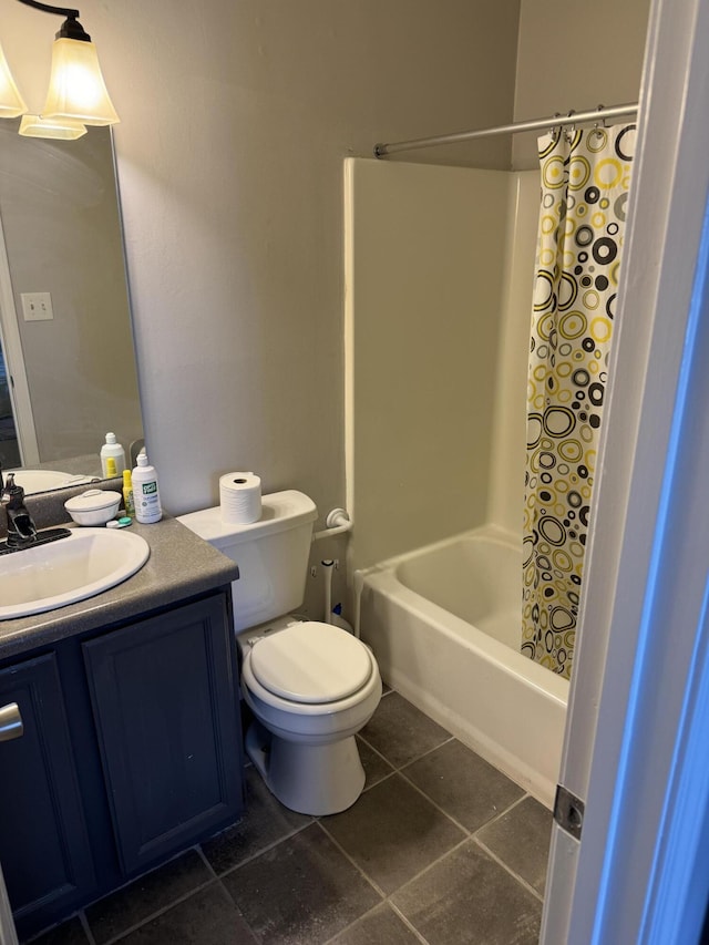 full bath featuring toilet, tile patterned flooring, shower / tub combo with curtain, and vanity