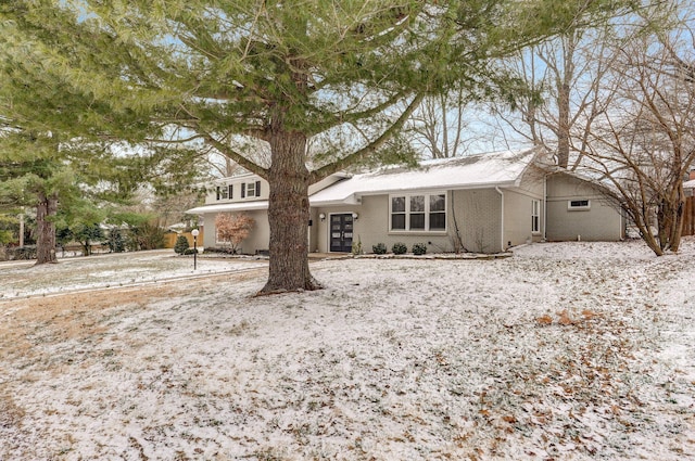 view of front of home with brick siding