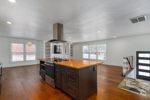 kitchen with dark wood-style floors, visible vents, open floor plan, stainless steel electric range oven, and island exhaust hood