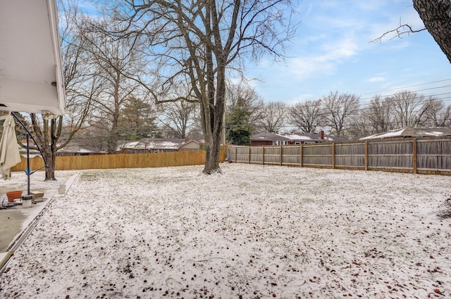 view of yard with a fenced backyard