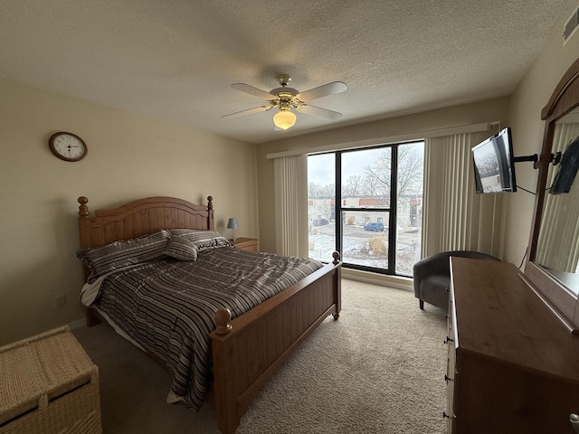 85 La Jolla Dr Unit 352-A, Lake Ozark, MO 65049 - bedroom featuring light carpet, ceiling fan, visible vents, and a textured ceiling