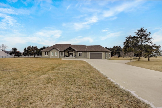 single story home featuring a garage, driveway, a front lawn, and fence