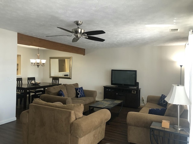 living area with a textured ceiling, beam ceiling, dark wood-style floors, and visible vents