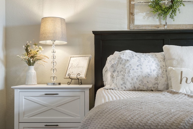 bedroom with a textured wall