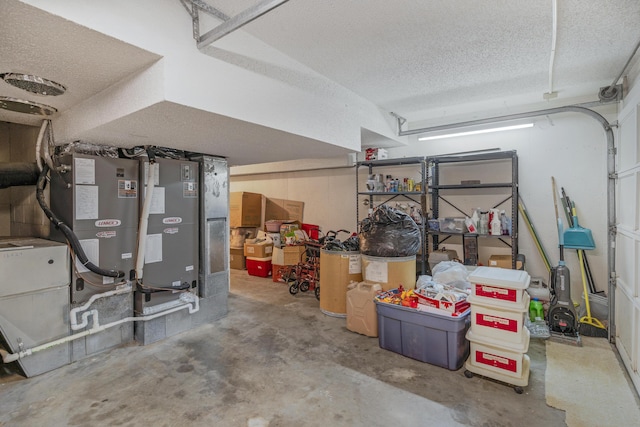 interior space featuring a garage and a textured ceiling