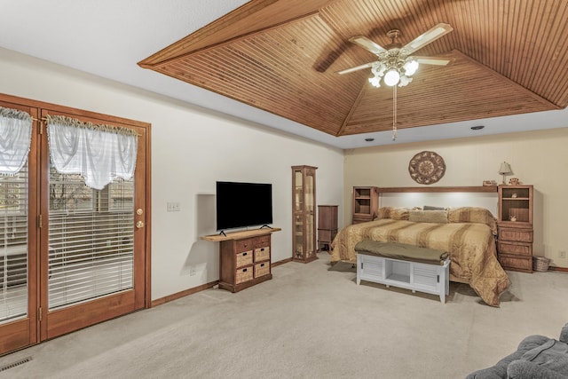 bedroom with visible vents, access to outside, carpet, wooden ceiling, and a raised ceiling