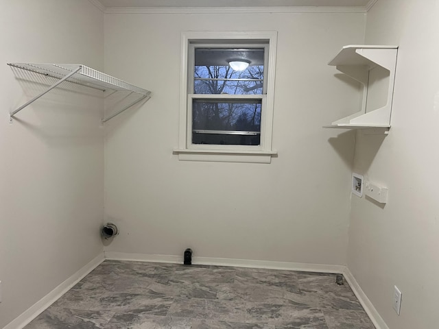 laundry room featuring hookup for a washing machine, laundry area, and baseboards