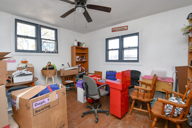 office with ceiling fan and wood finished floors