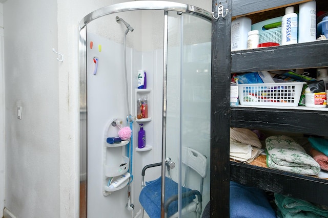 full bathroom featuring a stall shower