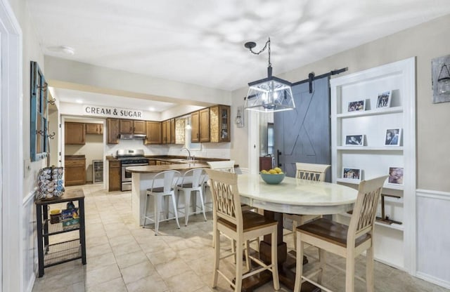 dining area with a barn door