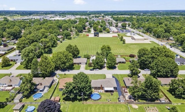 birds eye view of property with a residential view