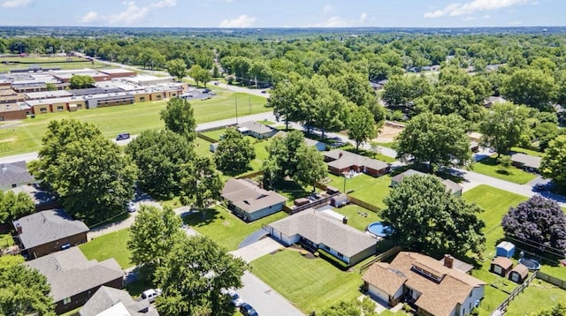 aerial view with a residential view and a wooded view