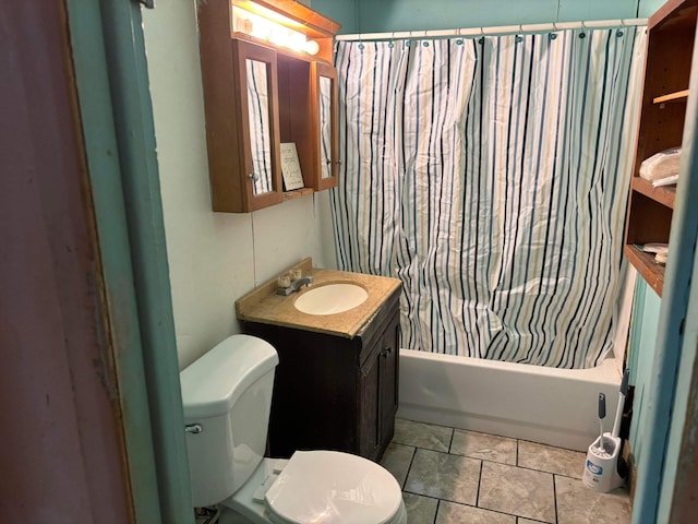 bathroom with toilet, shower / bath combo with shower curtain, and vanity