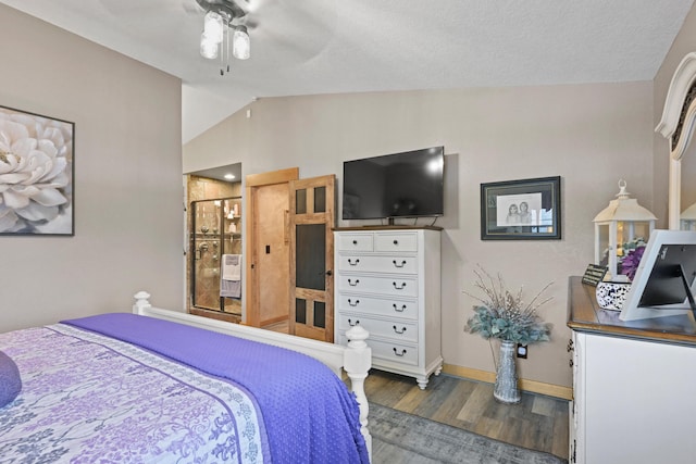 bedroom with lofted ceiling, dark wood-style floors, baseboards, and a ceiling fan