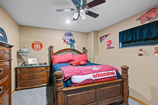 bedroom with carpet floors, ceiling fan, and baseboards